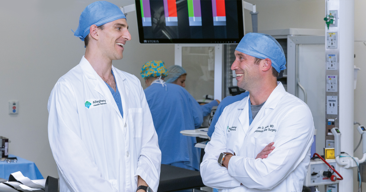 Surgeons chatting in an operating room 