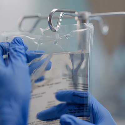 Close-up of an IV drip administering chemotherapy for squamous cell skin cancer treatment.