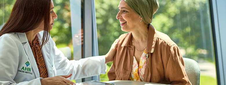 Cancer patient listening to AHN cancer specialist