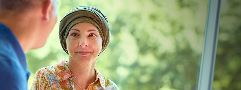 Cancer patient listening to an AHN Cancer specialist